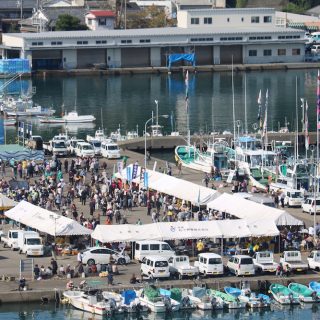 Taiji Whale Festival - banger boats docked in harbor and vendors selling dolphin meat, 11-6-16