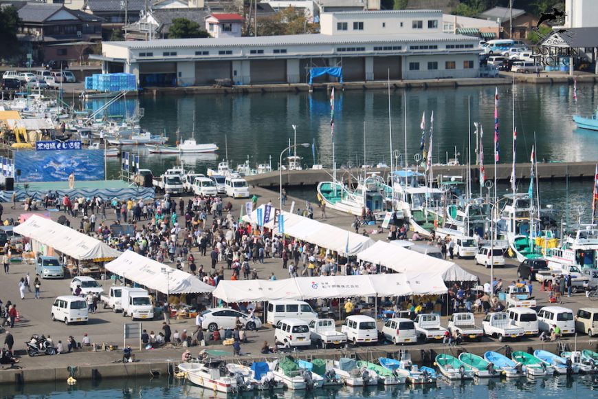 Taiji Whale Festival - banger boats docked in harbor and vendors selling dolphin meat, 11-6-16