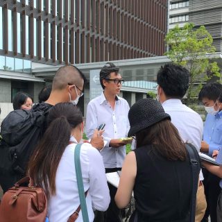Featured image: Ren Yabuki of Life Investigation Agency (LIA) speaks to journalists in front of Wakayama district court August 22, 2022